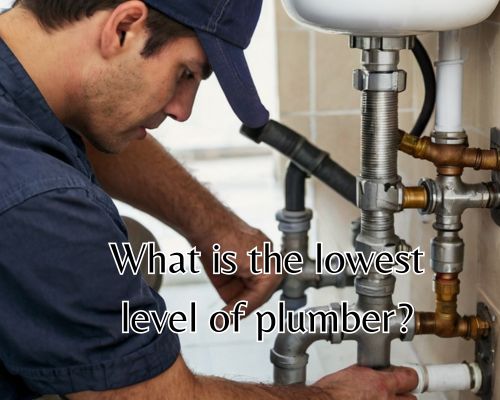 a plumber working on drain pipe