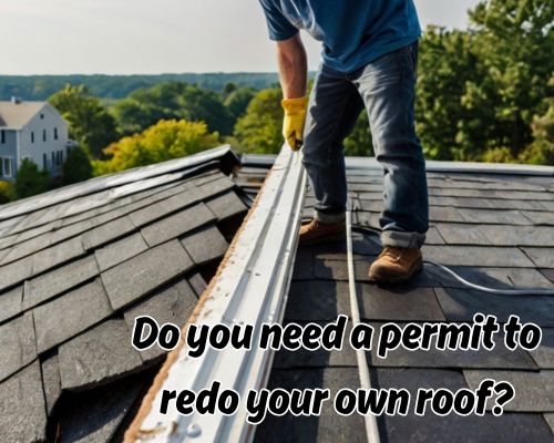 Roofer installing underlayment layer.